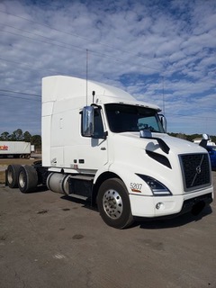 White Volvo side view